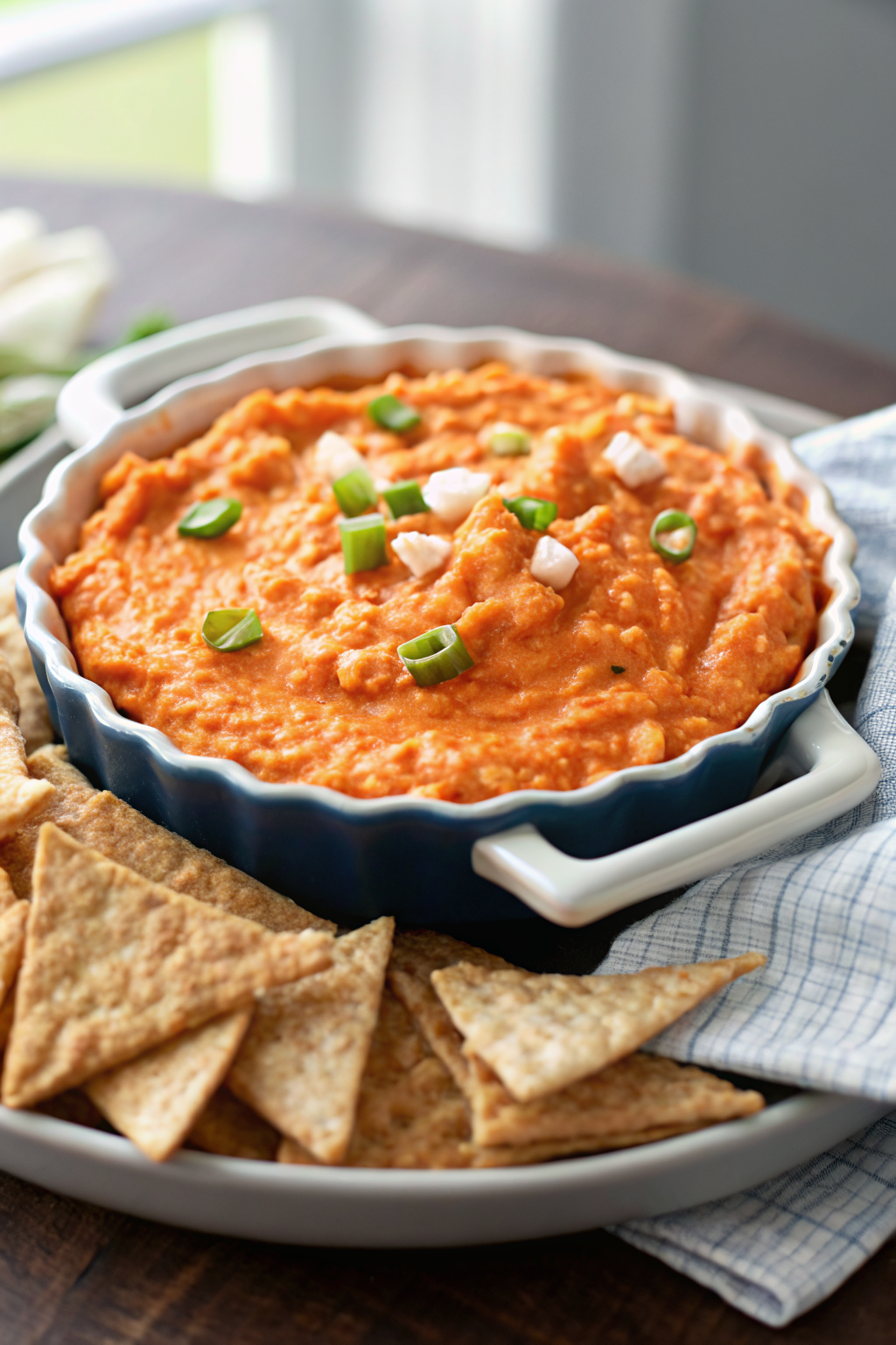 Buffalo Chicken Dip slice on plate showing perfect texture and swirl pattern