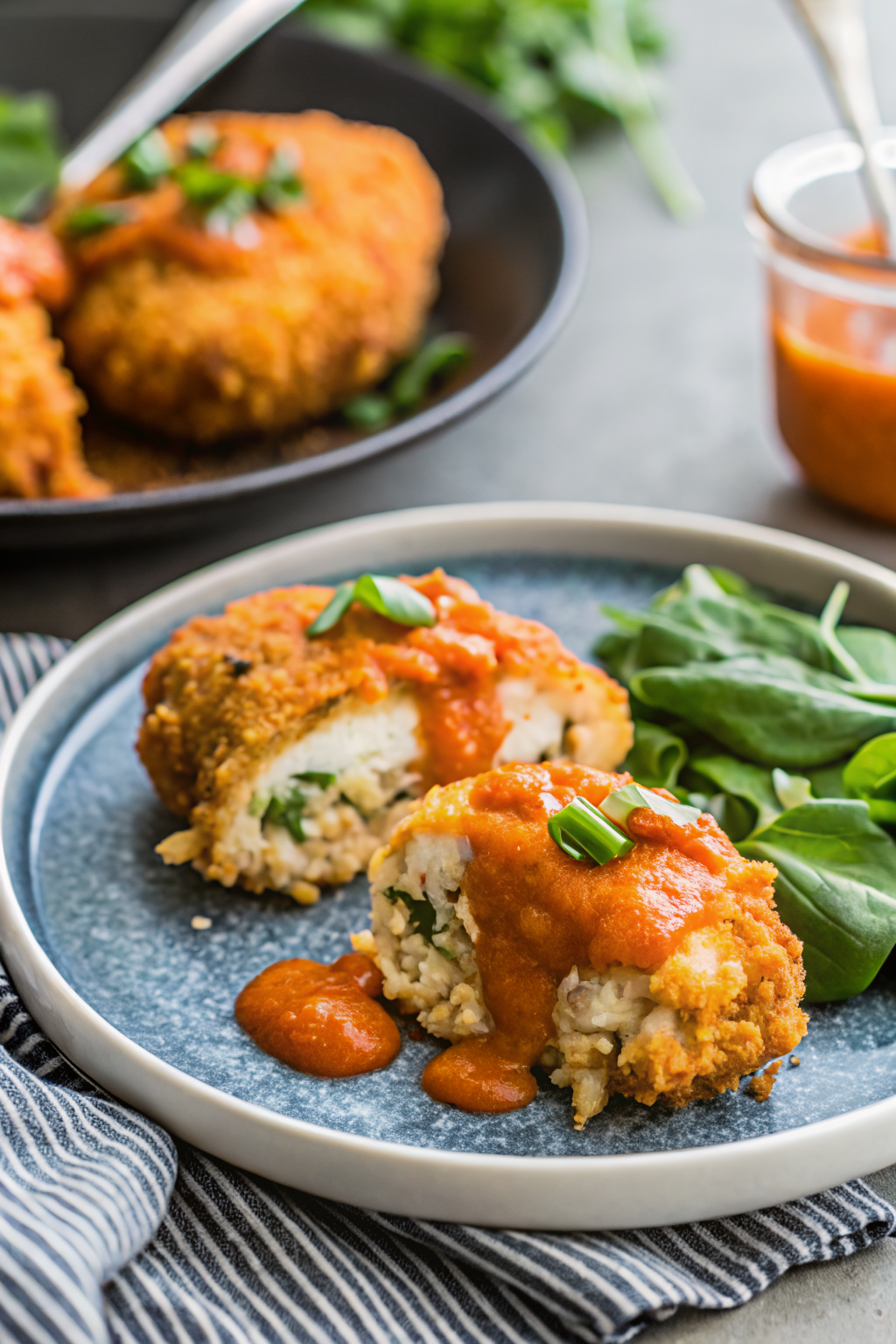 Stuffed Buffalo Chicken slice on plate showing perfect texture and swirl pattern
